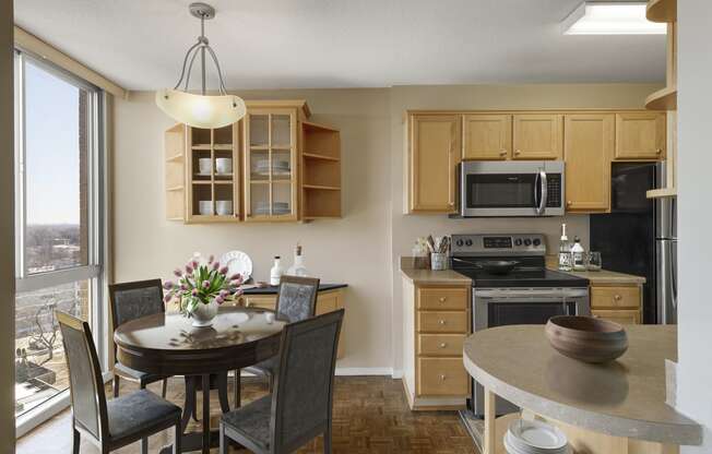 a kitchen and dining area in a 555 waverly unit