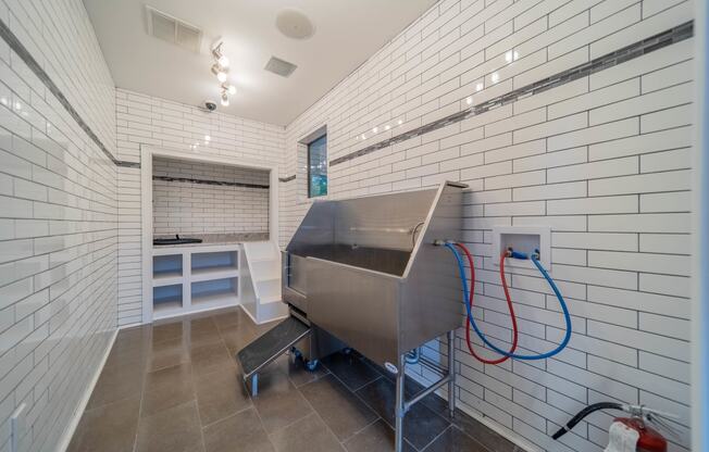 a bath room with a bath tub and a sink