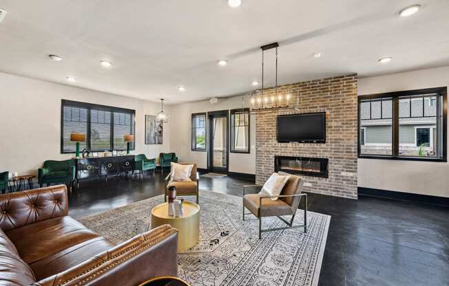 a living room with a fireplace and a television