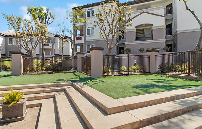 Exterior Community Building and Landscape at Reserve at Rancho Apartments located in Moreno Valley, CA.