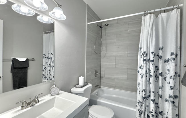 Clean and functional full bathrooms provide a comfortable space for daily routines.