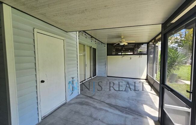 LOCATION LOCATION! 2/2 1234 Sq. Ft. with HUGE living room, community pool, indoor laundry and giant screen porch!!
