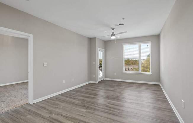 Flatiron West Trade Apartments unstaged model unit large living room.