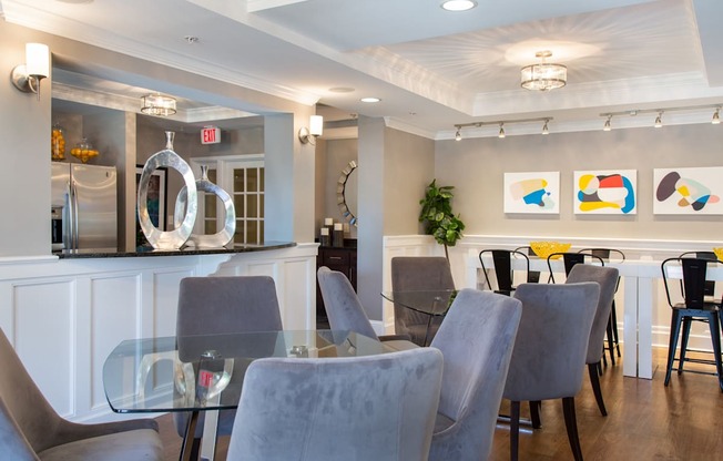 Dining Room Seating with Two Tables and Four Chairs and Family Style Dining Table or Work From Home Space at Canton Woods apartments in MA.