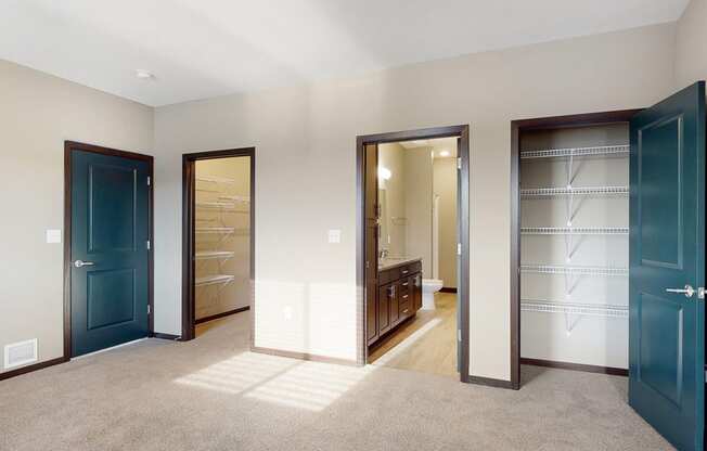 You'll love the large walk-in closet in the master bedroom of the Snowdrop with den floor plan at WH Flats.