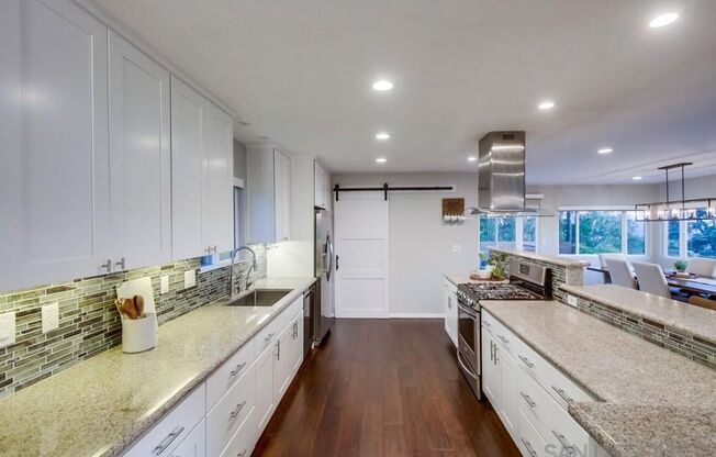 Exquisite Furnished Smart Home in Private Mt. Helix Oasis – Breathtaking Views,  convenience of two ultra-fast EV chargers**, among the fastest on the market, ensuring quick and efficient charging right in your **spacious 5-car driveway**!