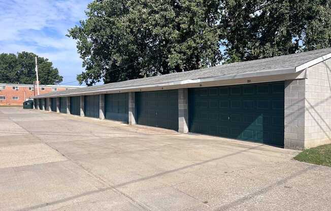 A long row of garage doors are closed.