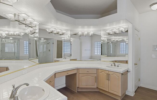 Gated Desert Shores Home with In ground pool and spa/Downstairs Master
