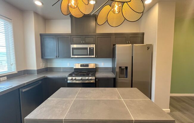 Your Modern Retreat with Open Living Spaces and Private Garage, across from park, Bethany Village area