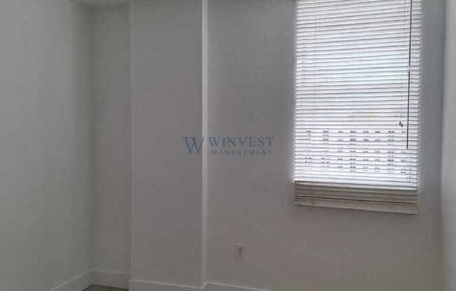 115 SW 11th St