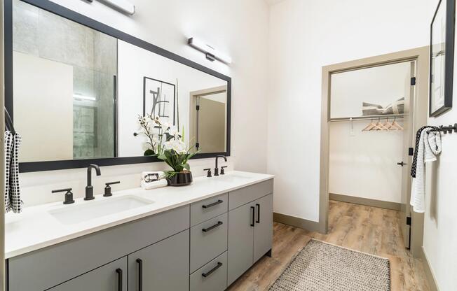 A spacious primary bath with dual vanities, clean finishes, and room to start and end your day with ease.