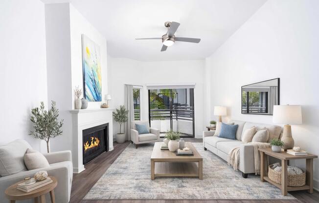 Featuring bright living rooms with cozy fireplaces in select homes, high ceilings, and access to a private balcony.