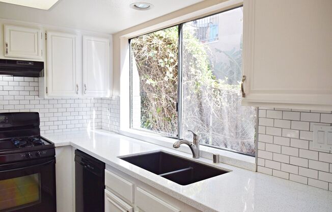 One Week Free Special! Modern 2 Bed 2.5Bath Townhome with Garage, Balconies & In-Unit Laundry in Linda Vista