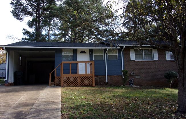 Fully Renovated 3 Bedroom 2 Bath Brick Ranch with Carport and Wired Storage Building