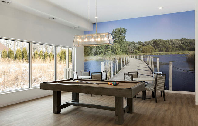 Bright windows illuminating gaming area in apartment building at Waterstone Place in Minnetonka