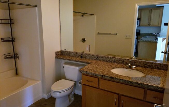 Gaslamp 1 bedroom with View, Wood floors, 820 sqft and parking.