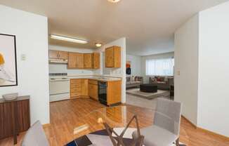 Fargo, ND Park Circle Apartments. a kitchen and living room in a 555 waverly unit