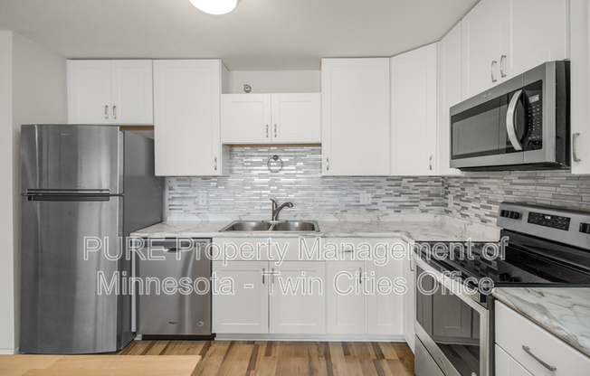 26 10th Street W