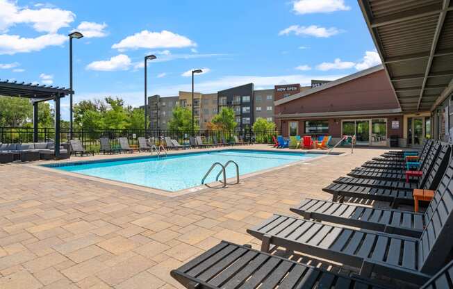TRIO @ Southbridge apartments pool and seating area
