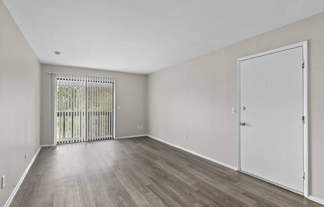 Livingroom with wood style flooring at Creve Coeur, Creve Coeur, MO