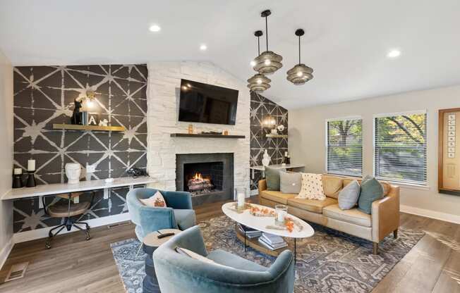 interior club room with sitting area and fireplace  at Ascent at Farmington Hills, Farmington Hills, MI