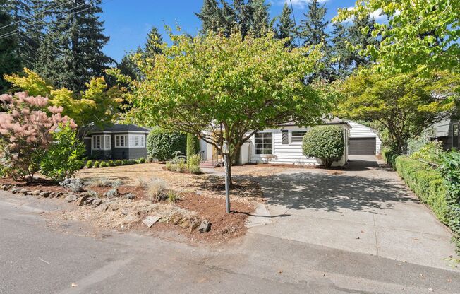Maywood Park Bungalow with Finished Attic & Basement, Fully Fenced Yard, and Air Conditioning!