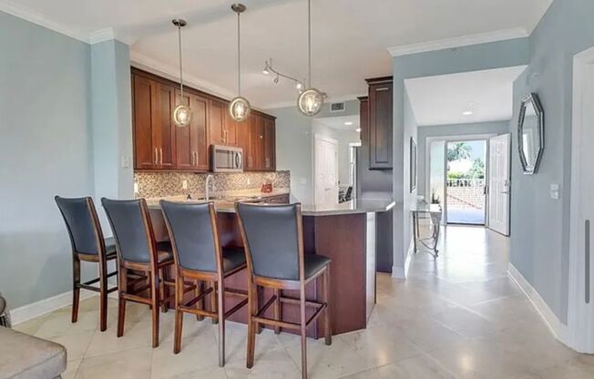 Seasonal Retreat in Prestigious Windstar on Naples Bay – 4650 Yacht Harbor Dr #125