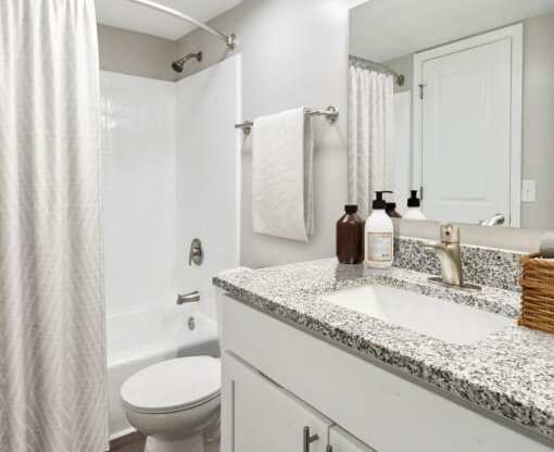 a bathroom with a sink and a toilet at Lake Johnson Mews, Raleigh, NC