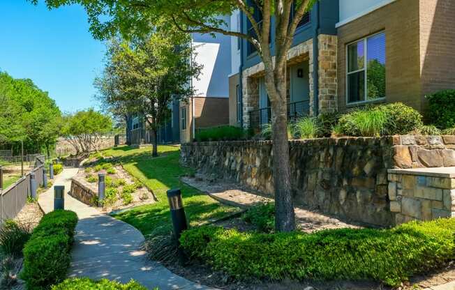 exterior building with lush landscaping at Berkshire Medical District apartments