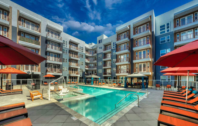 Beautiful resort- inspired pool with modern chaise lounges and relaxing cabanas at The Rey Downtown, Phoenix , Arizona