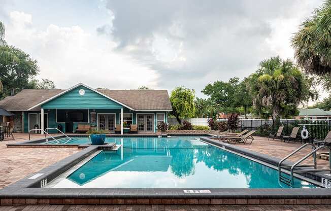 the pool and pool house at the resort at longboat key club