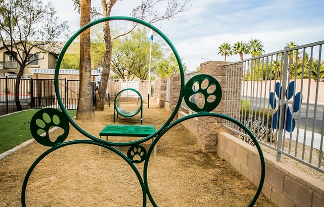 a playground with a round table and a ball in the middle