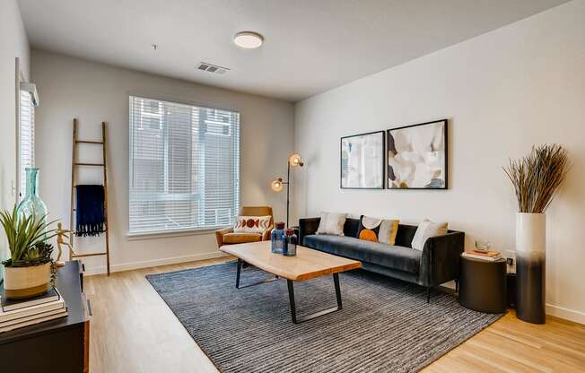 a living room with a couch and a coffee table