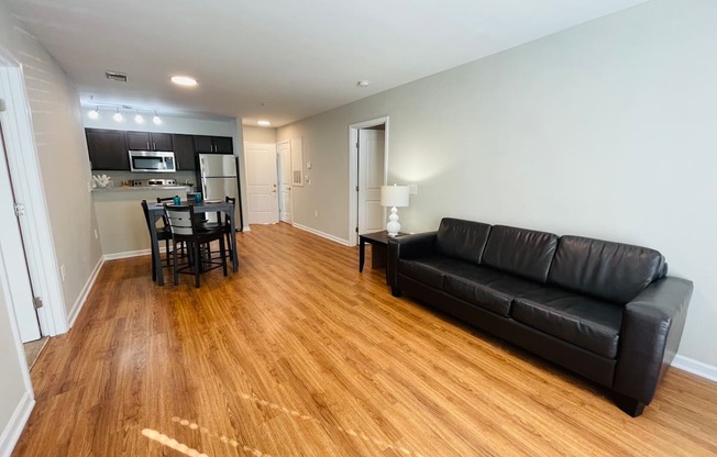 Two-bedroom living room at Oasis at Cedar Branch in Wilmington, NC