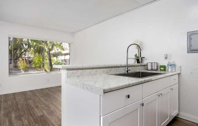 the preserve at ballantyne commons apartment kitchen with sink and window