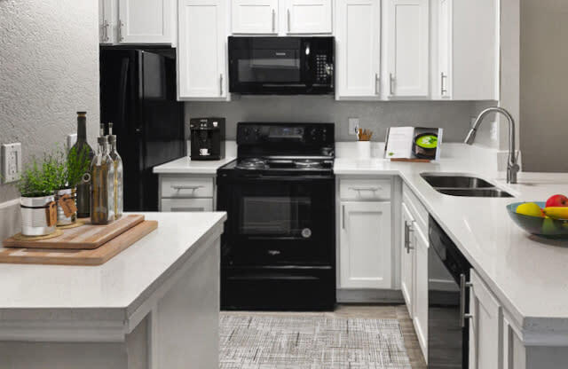 Kitchen with White Cabinets at Chapel View Apartments in Chapel Hill, NC