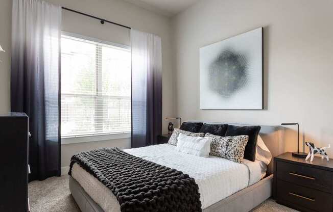 guest bedroom with portrait accents