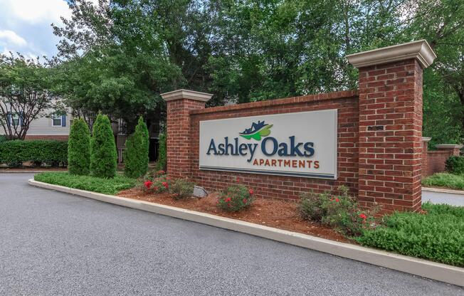 Brick monument sign at Ashley Oaks Apartments in Greensboro, North Carolina
