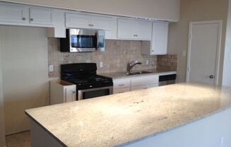 3 Bed, 2 Bath. Hardwood floors, quartz countertops, stainless steel appliances.