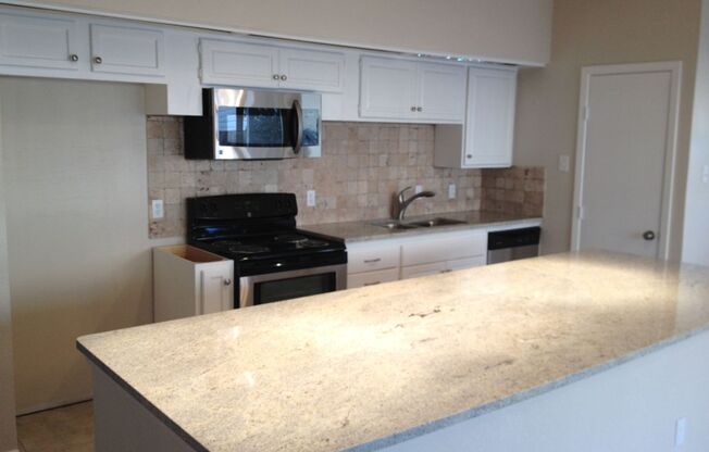 3 Bed, 2 Bath. Hardwood floors, quartz countertops, stainless steel appliances.