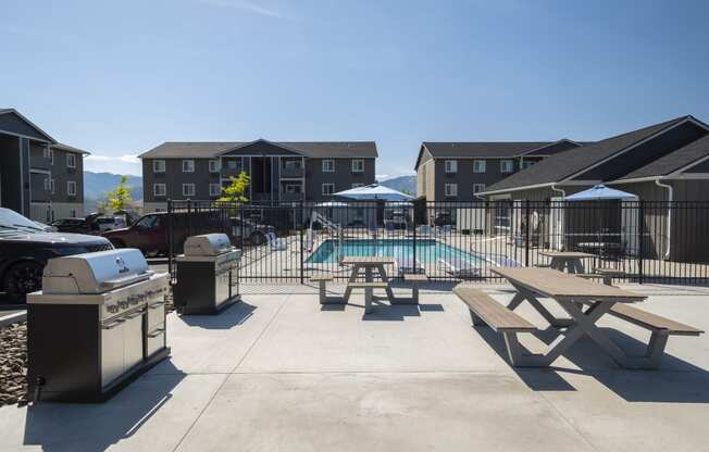 take a dip in the pool at the whispering winds apartments in pearland, tx  at Altitude, Washington, 98802