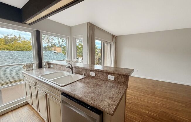Spacious 1B/1BA Condo w/ Gated Parking & Canyon Views from Balcony!