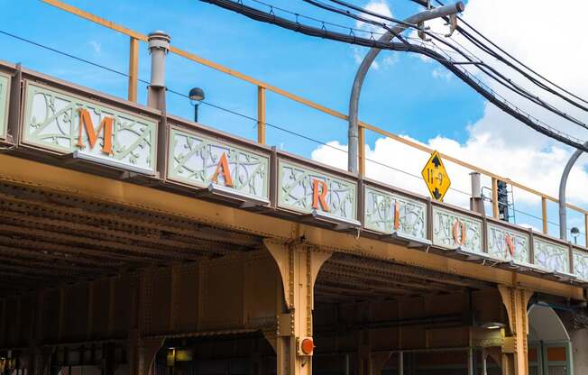 A train station with a sign that reads