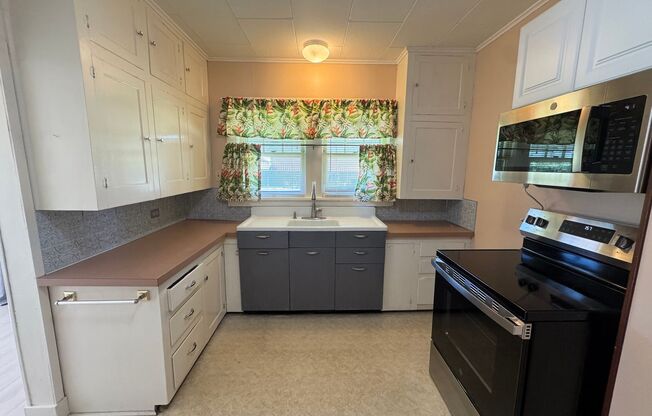 Spacious & Updated Home with Bonus Room, Large Basement, & Garage