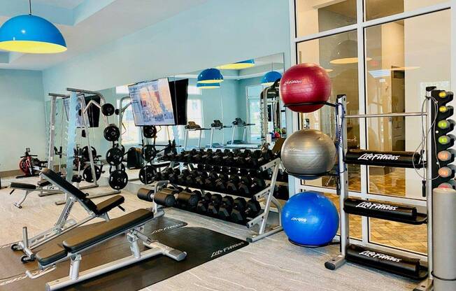 View of Cottonwood Clermont Gym Showing Free Weights and Smith Machine