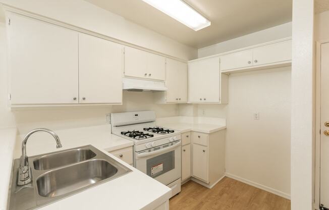 Kitchen with White Appliances and White Cabinets