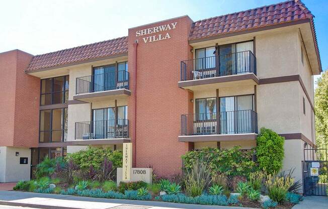 a building with a sign that says sherwin williams villa  at Sherway Villa, Reseda, 91335