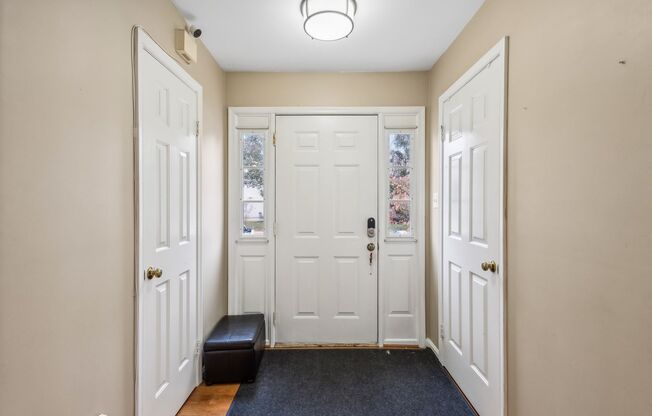 Modern Brick End-Unit Townhome with Stunning Upgrades and Serene Wooded Views