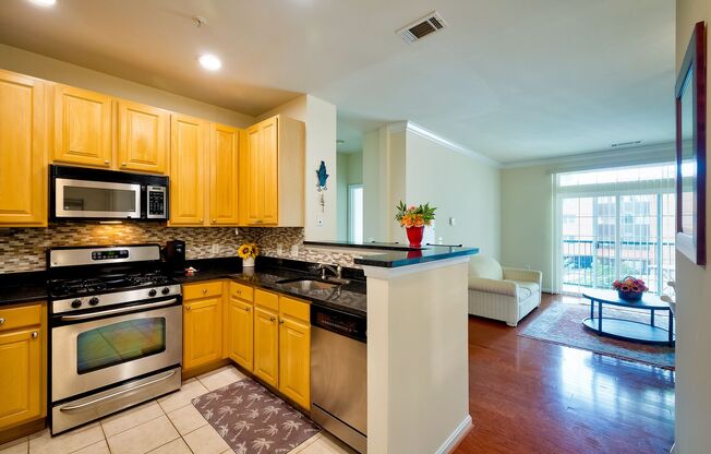 Partially Furnished Elegant 2BD Condo with Unbeatable Access & Premium Features in Arlington w/ Parking!