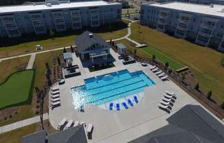 an aerial view of a swimming pool at the resort